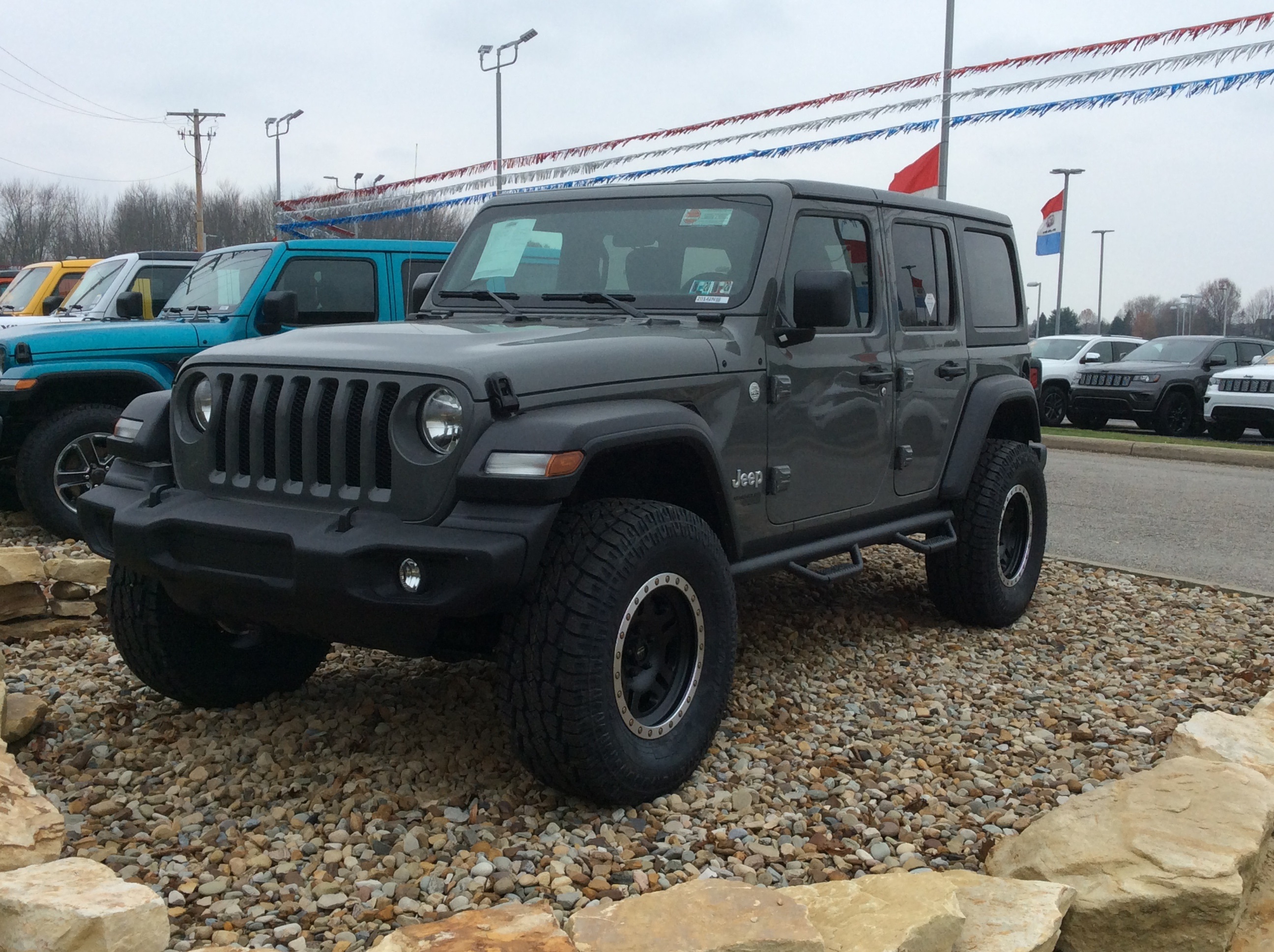 lifted JK Wrangler 2014 Dune color with Atlas bumpers from DSI